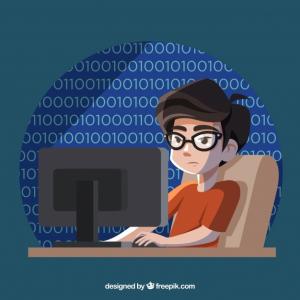 Freepik / www.freepik.com Noi amb ulleres teclejant davant d'un ordinador